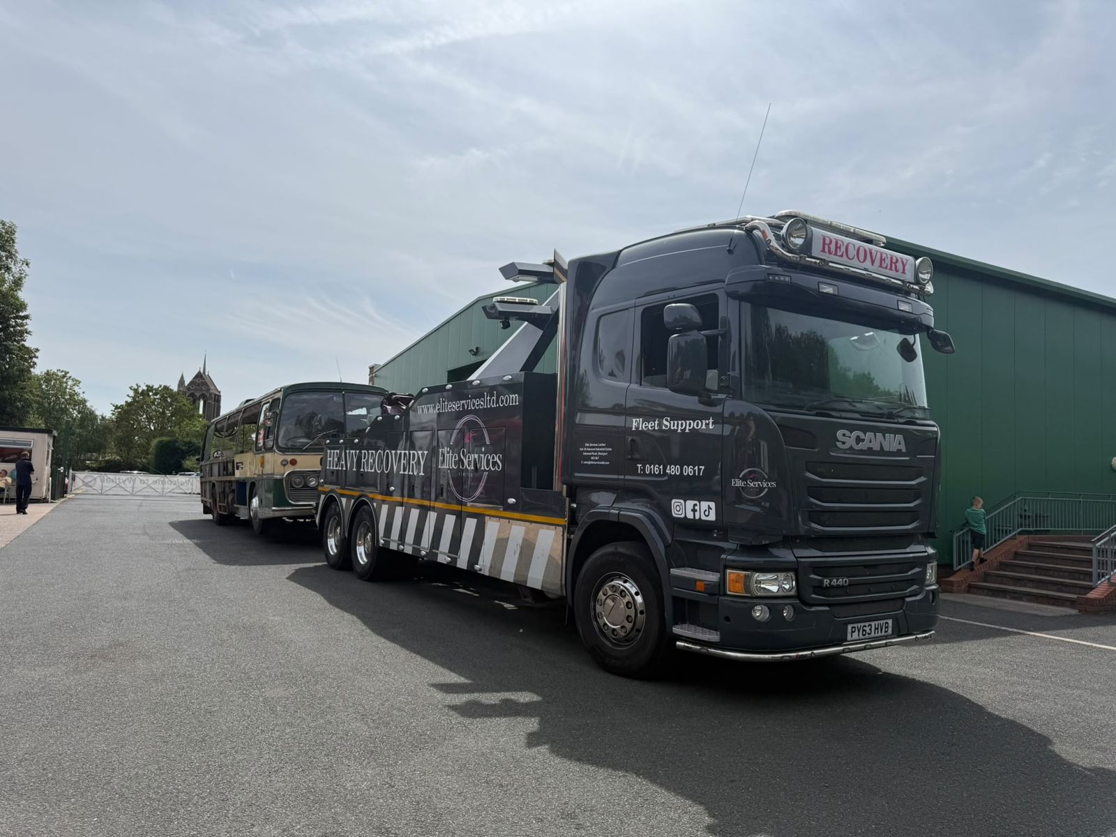 PY63 HVB, our Scania recovery truck, towing a coach